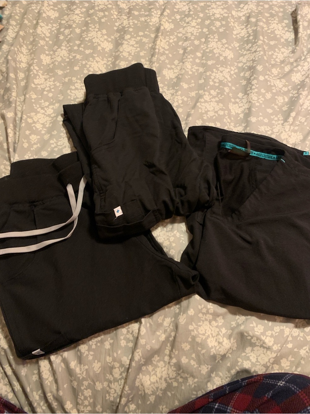 2 scrub pants and 1 shirt